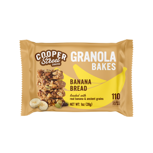 A Banana Bread Granola Bake bar by Cooper Street Snacks. Package shows a whole grain bar loaded with real bananas, semi sweet chocolate, pumpkin seeds, chia seeds, flax seeds, and whole oats. 