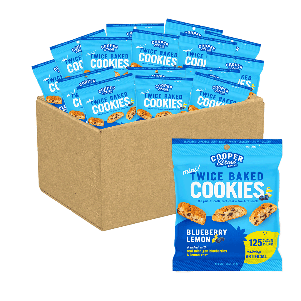 A 24 pack of Blueberry Lemon Twice Baked Cookies by Cooper Street. Each mini cookie is 25 calories and loaded with real Michigan blueberries and lemon zest.
